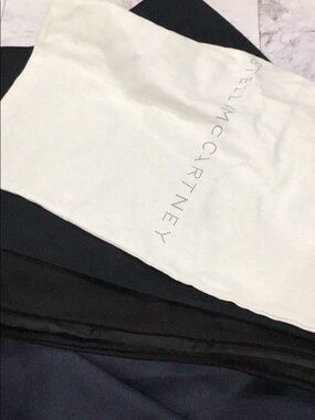 bundle of 9 designer dust bags